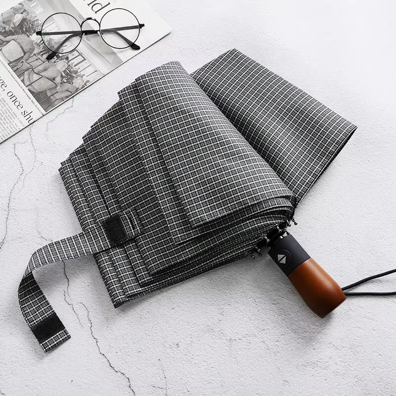 Klassischer Taschenschirm mit Hahnentritt-Karomuster